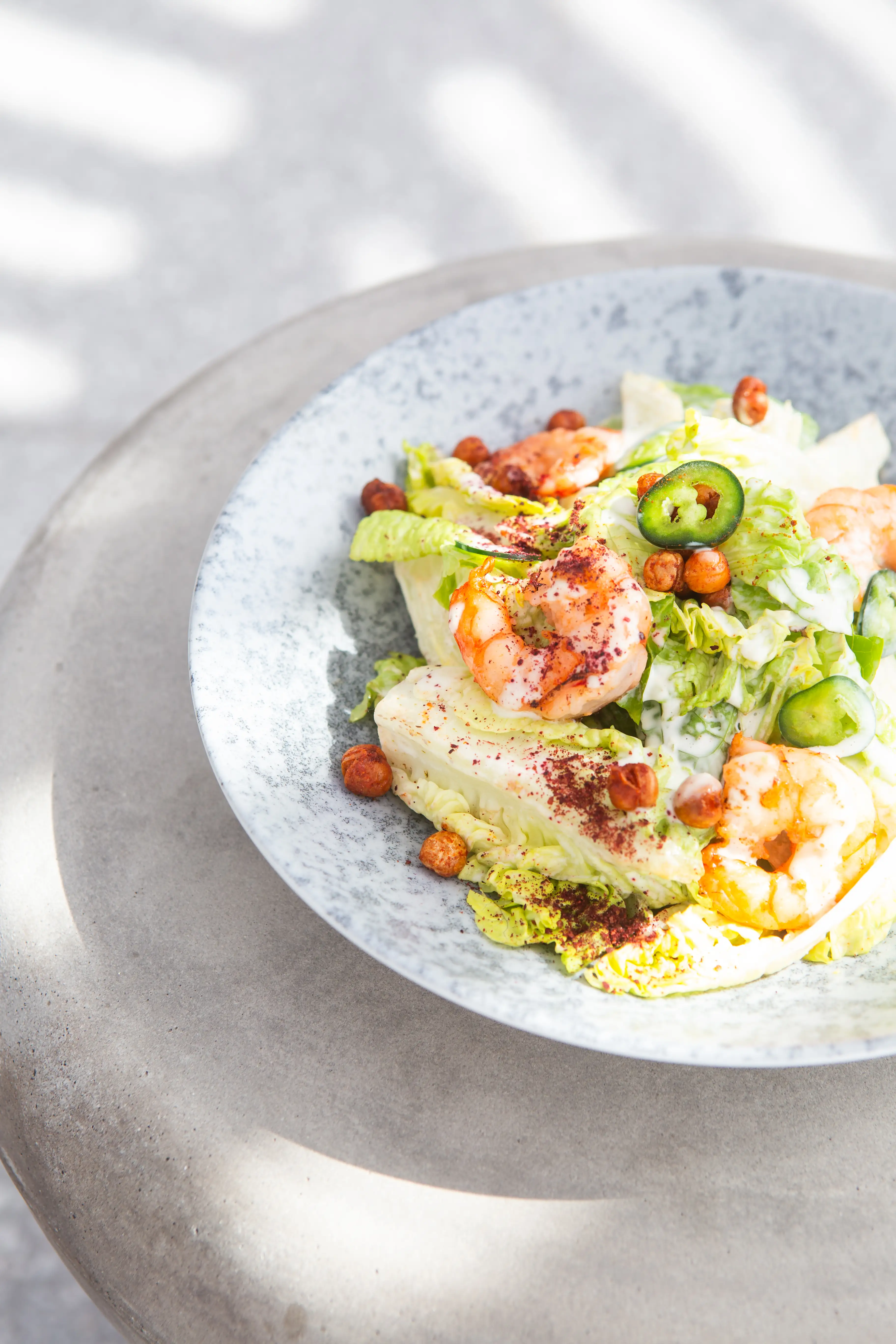 Grilled shrimp salad with crisp greens and citrus notes